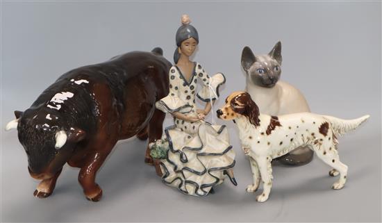 A Lladro figure, a Copenhagen Siamese cat, a Beswick dog and a Sylvac bull